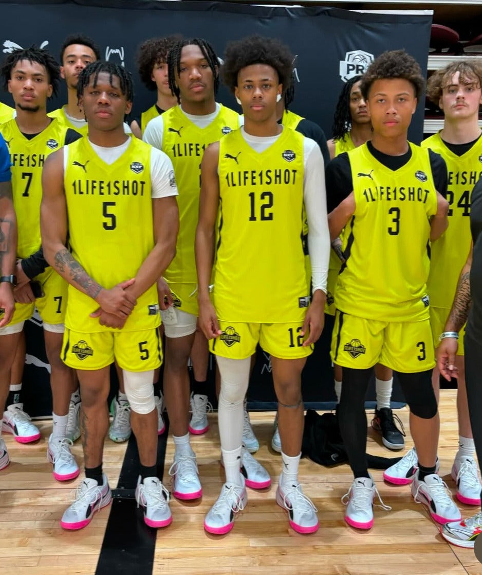 1Life1Shot basketball players in yellow uniforms posing together